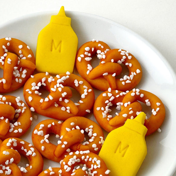 marzipan pretzels and mustard closeup