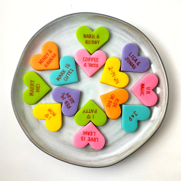 personalized conversation hearts on a plate