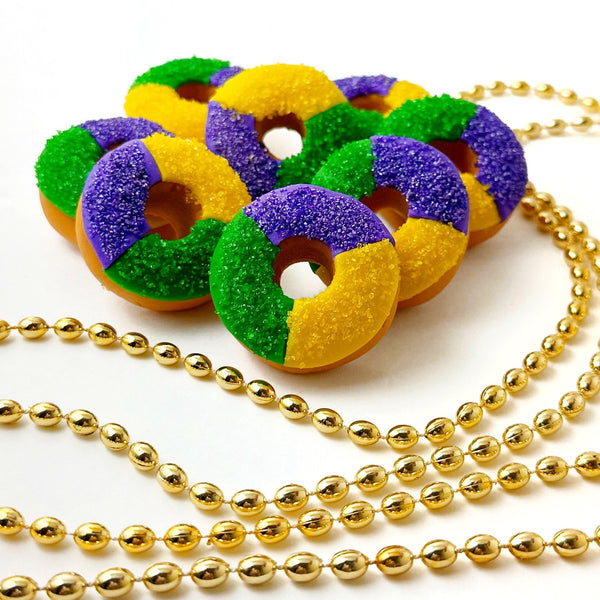 mardi gras mini king cakes with gold beads