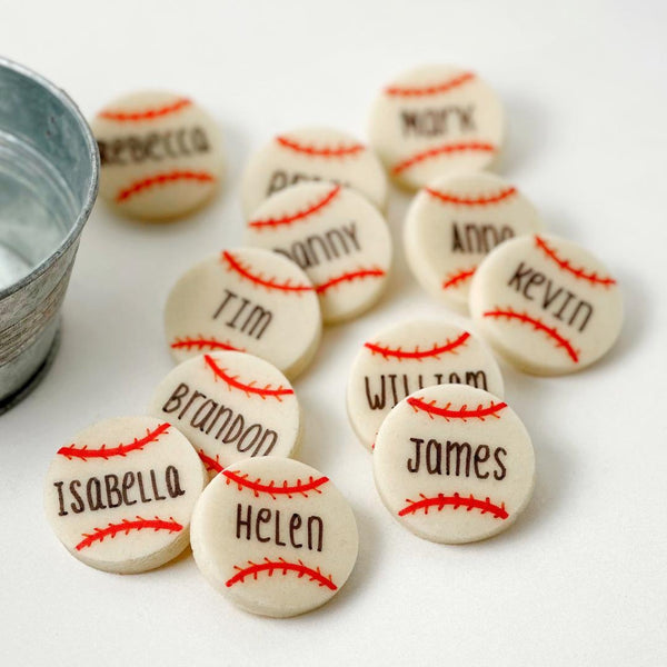 personalized baseball marzipan candy tiles next to a bowl