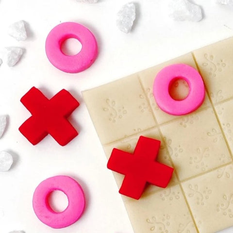 Valentine's Day X's and O's tic tac toe marzipan candy treats close up