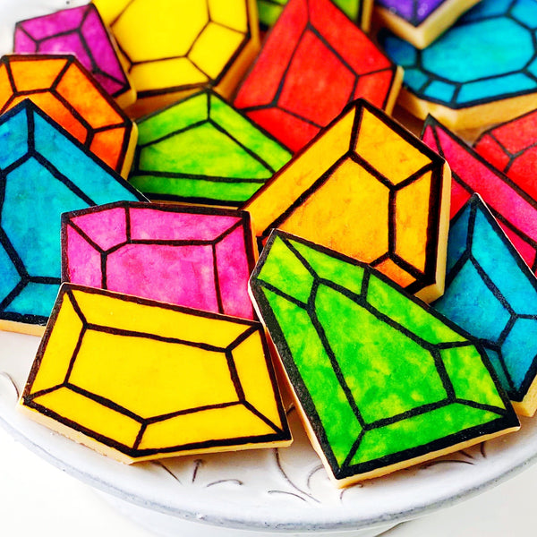 shiny jewel gemstones gift marzipan candy tiles closeup