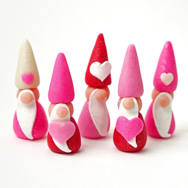 valentine's day marzipan pink red gnomes in a row