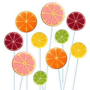 citrus fruit with oranges, grapefruits, lemons and limes marzipan candy lollipops