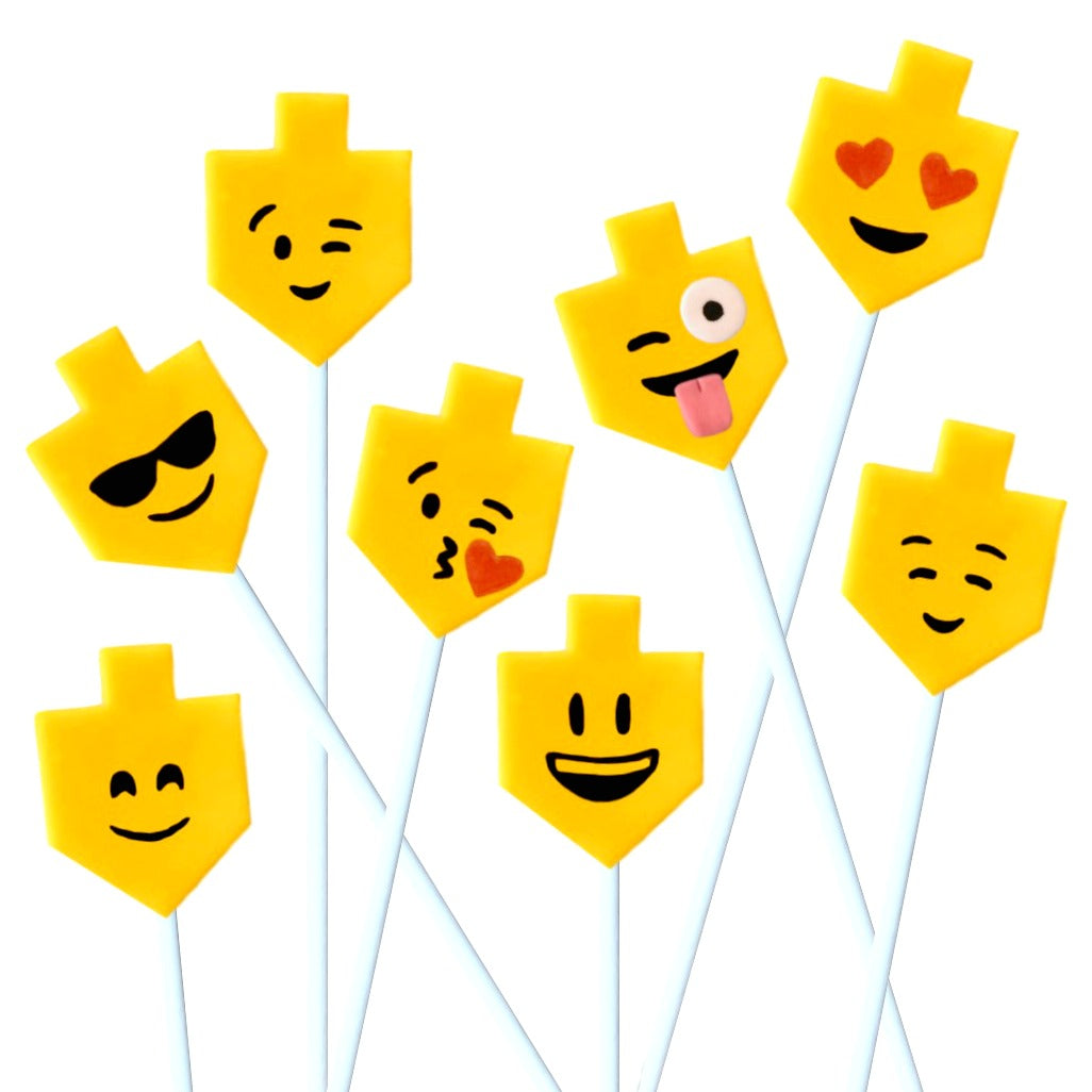 Hanukkah emoji yellow dreidels marzipan candy lollipops