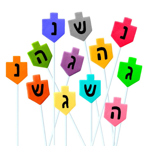 Hanukkah colorful dreidels marzipan candy lollipops