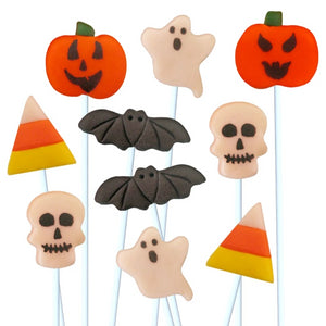 Halloween with ghosts, skulls, bats, jack o lantern pumpkins and candy corn marzipan candy lollipops