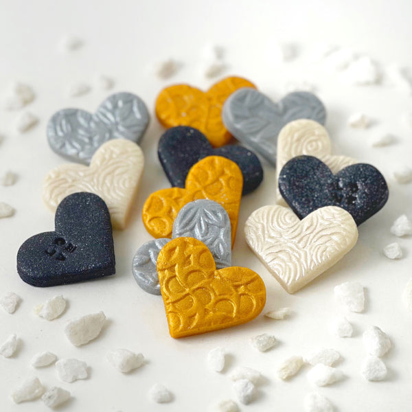 valentine's day elegant gold silver marzipan hearts flatlay
