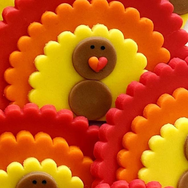 giant Thanksgiving turkeys marzipan candy lollipops in a pile