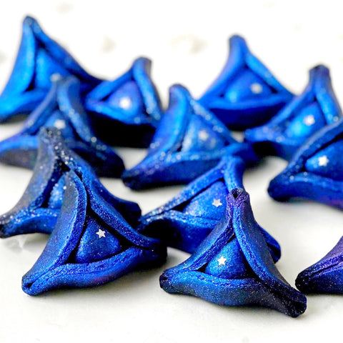 purim blue galaxy hamantaschen closeup