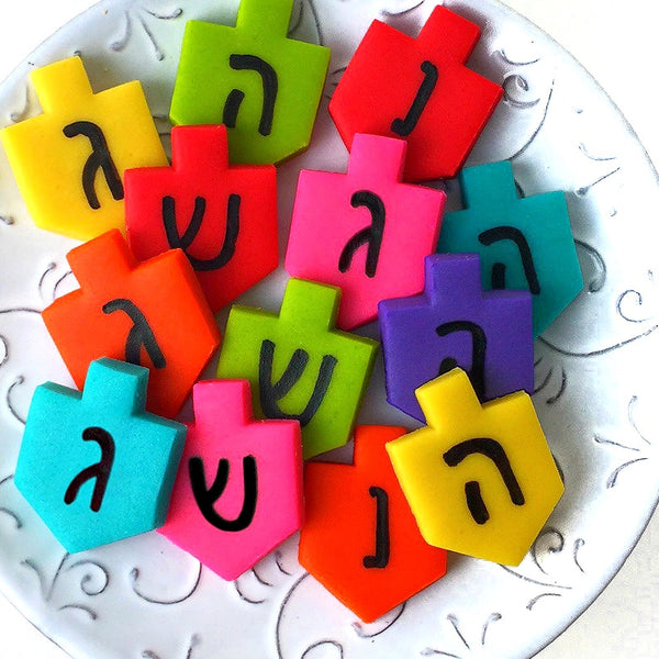Hanukkah rainbow dreidels marzipan candy tiles on a plate