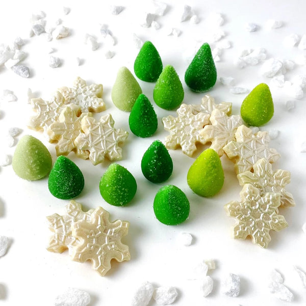 sparkly snowflakes and green trees marzipan candy sculpture treats