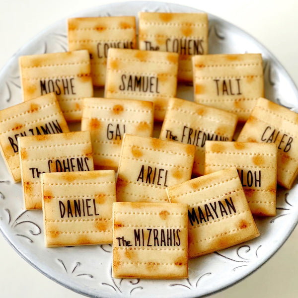 personalized marzipan matzah place settings on a plate