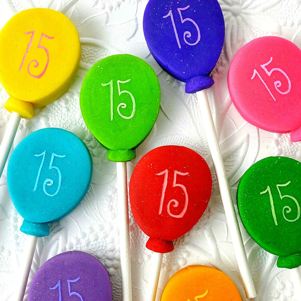 birthday balloon marzipan candy lollipops close up
