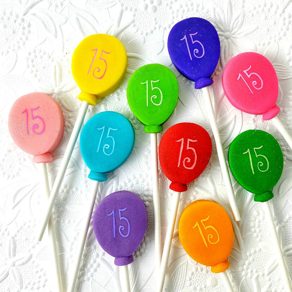 birthday balloon marzipan candy lollipops flatlay