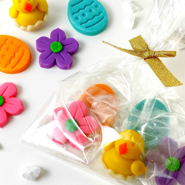 Easter marzipan treat bag with chicks, eggs and flowers closeup