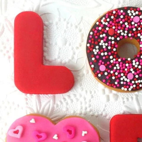 Valentine's Day love donuts doughnuts marzipan candy sculpture treats close up