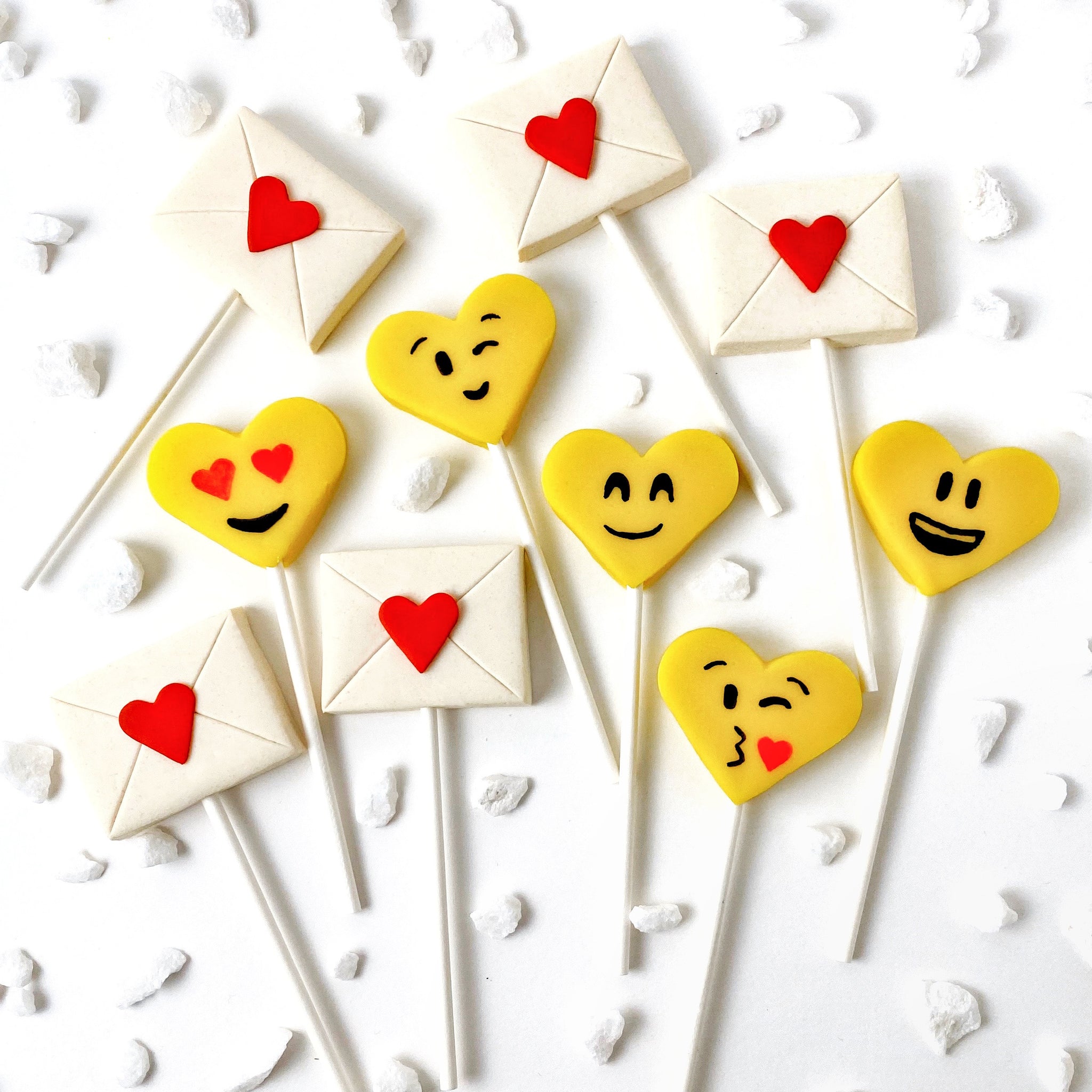 Valentine's Day yellow emoji hearts and love letters marzipan candy lollipops