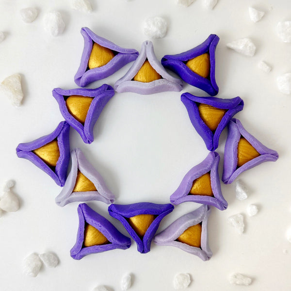 purple ombré marzipan hamamtaschen in  a star circle