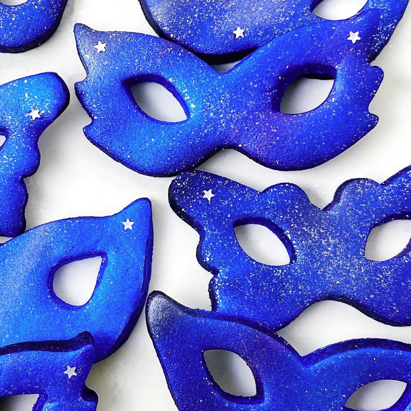 Purim galaxy masks marzipan candy treats closeup