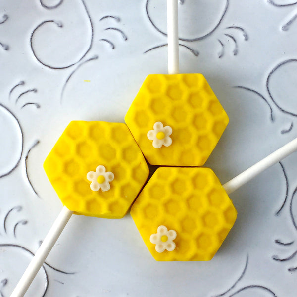 Rosh Hashanah honeycomb and honeybee marzipan candy lollipops