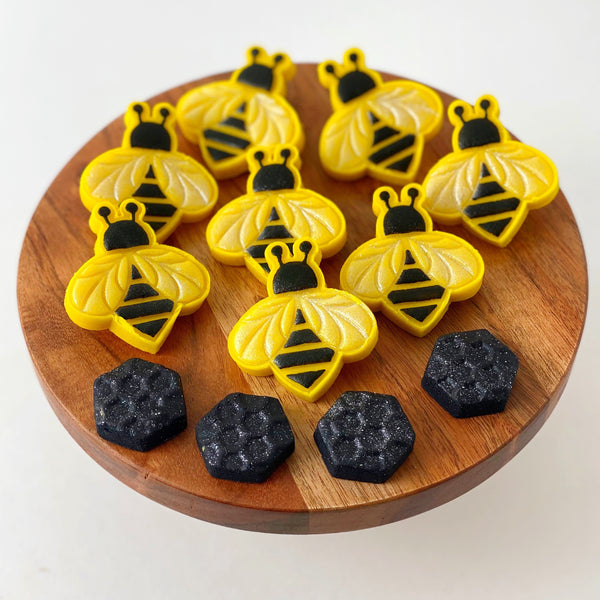 modern honeybee rosh hashanah tiles on a plate