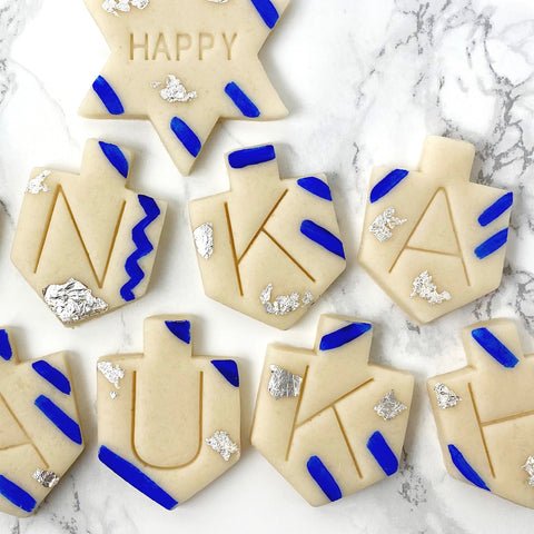 Happy Hanukkah greetings marzipan candy tile treats closeup