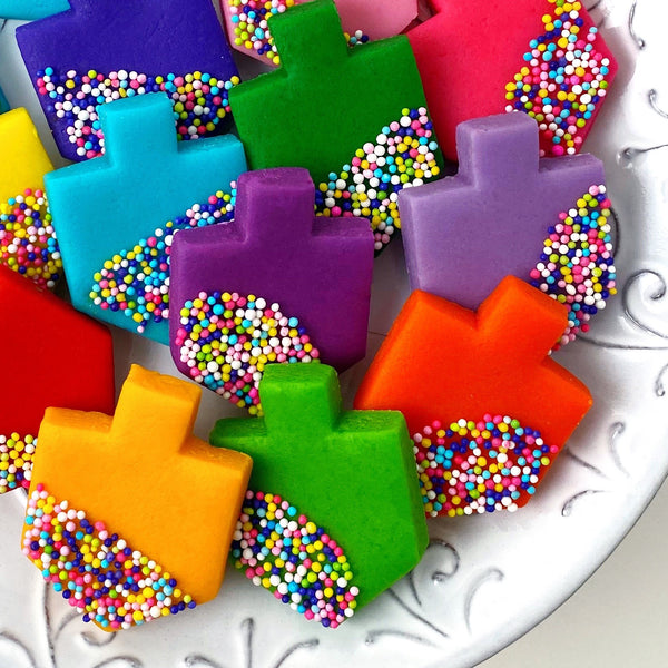Hanukkah rainbow sprinkle dreidels marzipan candy treats new close up