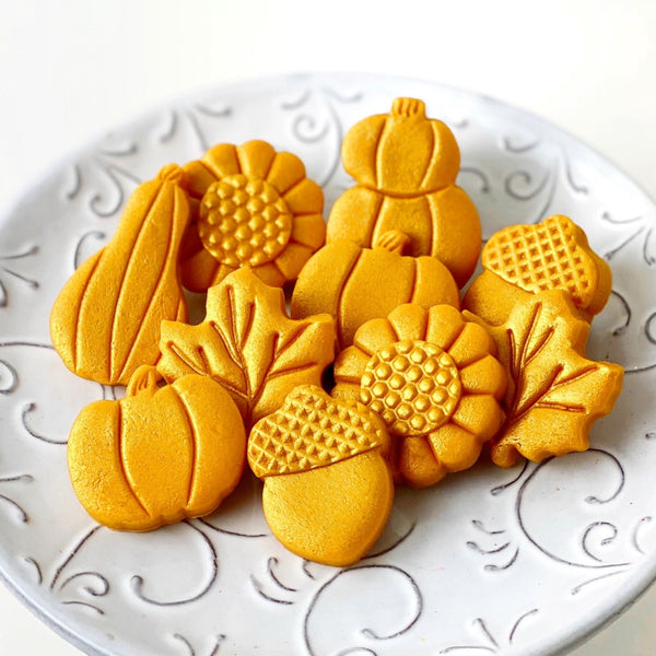 golden thanksgiving marzipan tiles on a plate