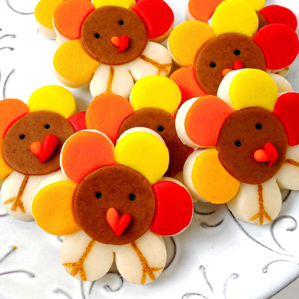Thanksgiving turkey flowers marzipan candy tiles closeup