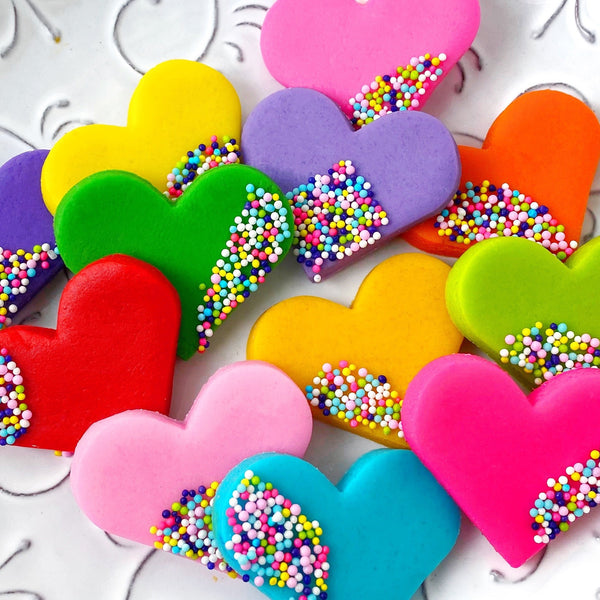 Valentine's Day sprinkle marzipan hearts rainbow closeup