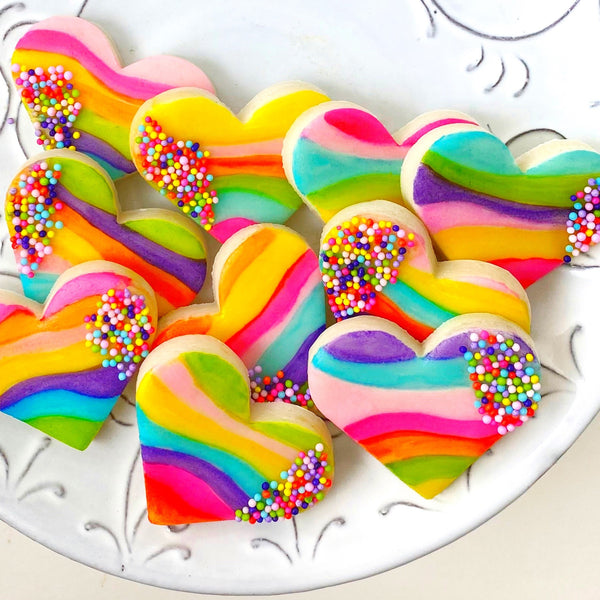 fantasy rainbow sprinkle hearts marzipan candy on a plate