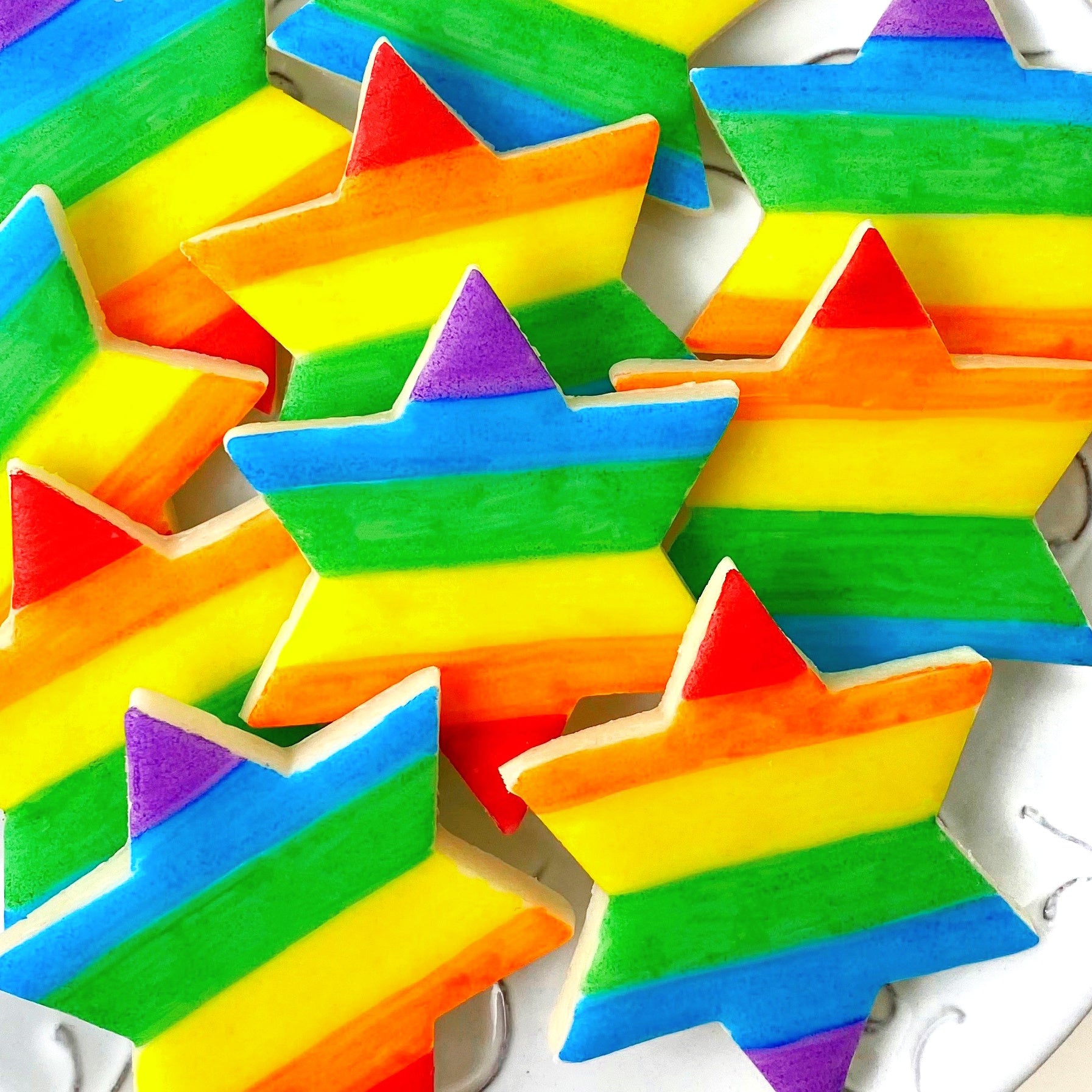rainbow pride star of David marzipan candy tiles closeup