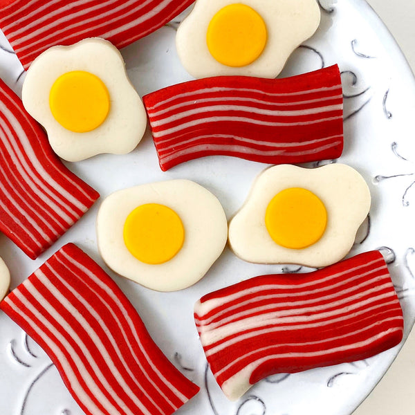 eggs bacon marzipan candy tiles closeup