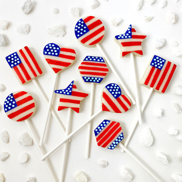 July 4th USA Independence Day stars and stripes in assorted shapes marzipan candy lollipops layout