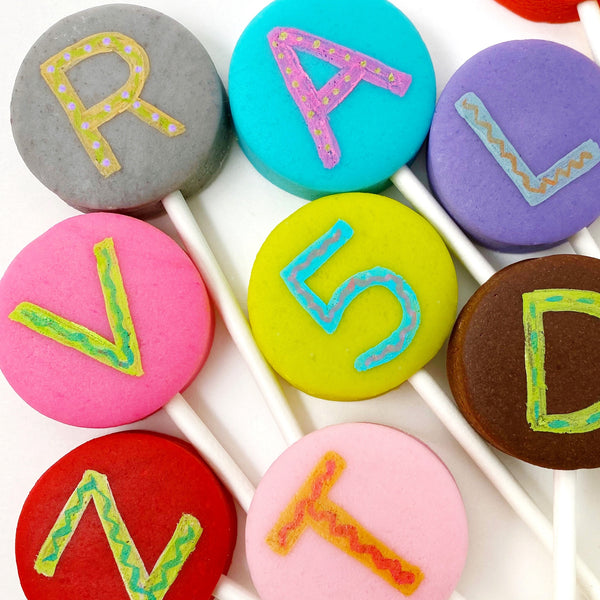 alphabet marzipan candy lollipops closeup