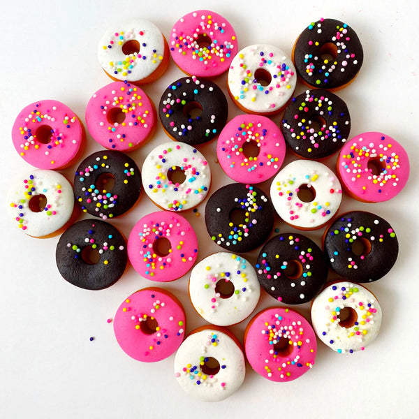 Sprinkle marzipan mini donuts candy pile