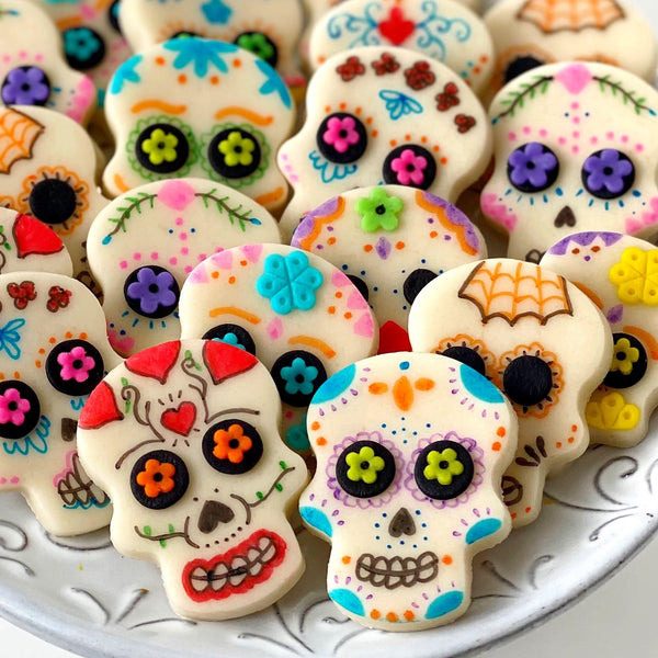 Halloween Day of the Dead modern sugar skull marzipan candy tiles on a plate