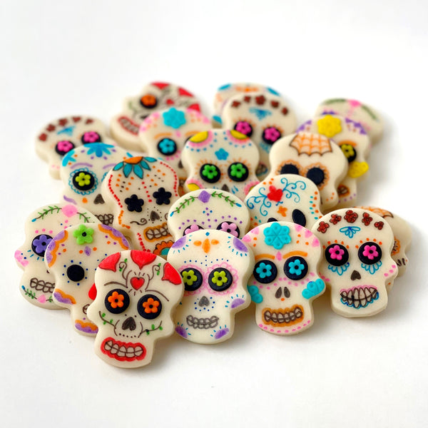 Halloween Day of the Dead modern sugar skull marzipan candy tiles in a pile