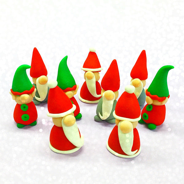 Christmas gnome, santa and elf trio marzipan candy sculpture treats in a large group