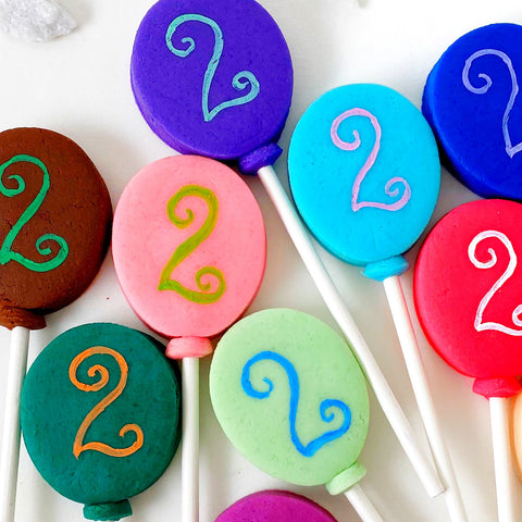 birthday balloon marzipan candy lollipops close up curly