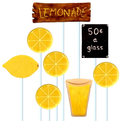 lemonade stand with lemons, cups and signs marzipan candy lollipops