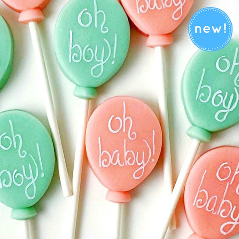 baby shower marzipan candy lollipops close up