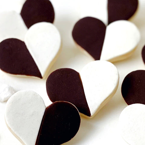 marzipan black white heart cookies closeup